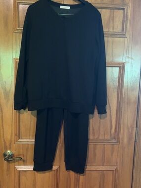 Black V-Neck Knit Top with Fabric Content Tag